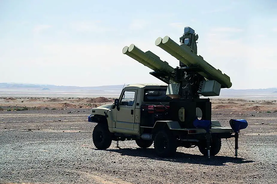 Compact Iranian AD-08 Majid short-range surface-to-air missile system mounted on a tactical vehicle.
