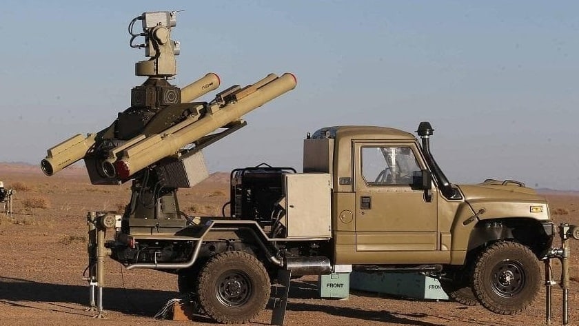 Compact Iranian AD-08 Majid short-range surface-to-air missile system mounted on a tactical vehicle.