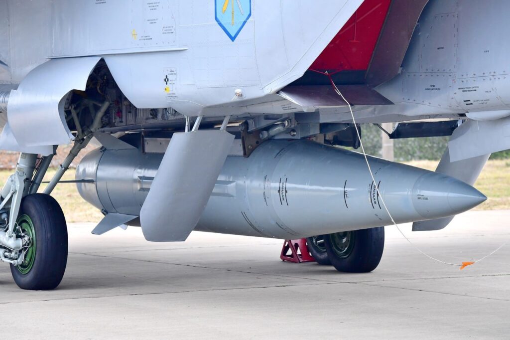 A Kh-47M2 Kinzhal air-launched ballistic missile mounted beneath a Russian MiG-31K aircraft. The missile is designed for hypersonic speeds exceeding Mach 10 and precision engagement of high-value targets.