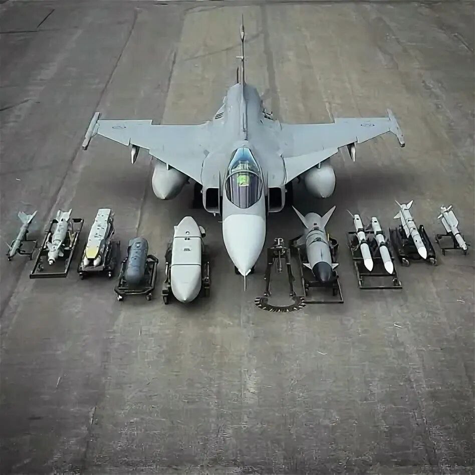 A JAS 39 Gripen multirole fighter jet equipped with air-to-air missiles and air-to-surface munitions, showcasing its versatile combat loadout.