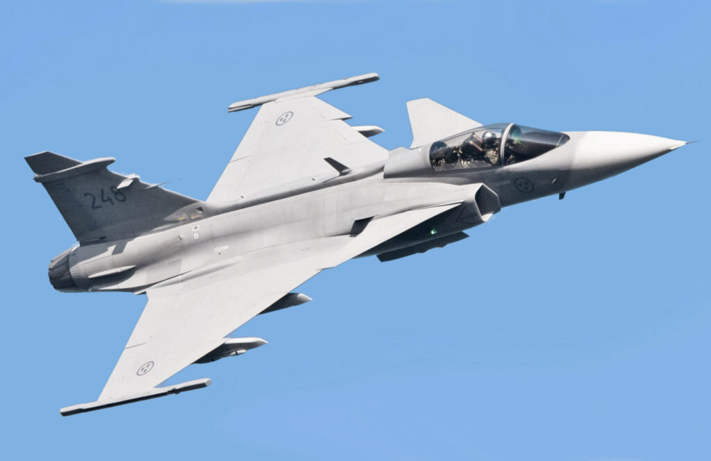Saab JAS-39 Gripen multirole fighter jet in flight showcasing its aerodynamic design and advanced avionics.
