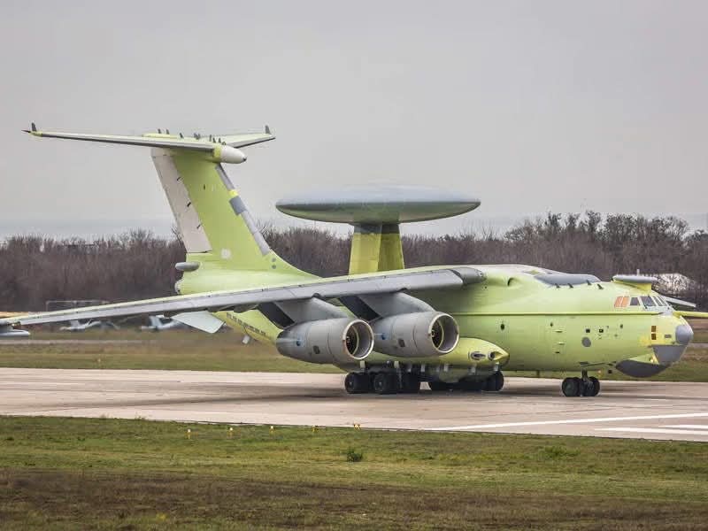 Close-up view of the Beriev A-100's rotating AESA radar dome, highlighting the Vega Premier system on the modernized Il-76 airframe.