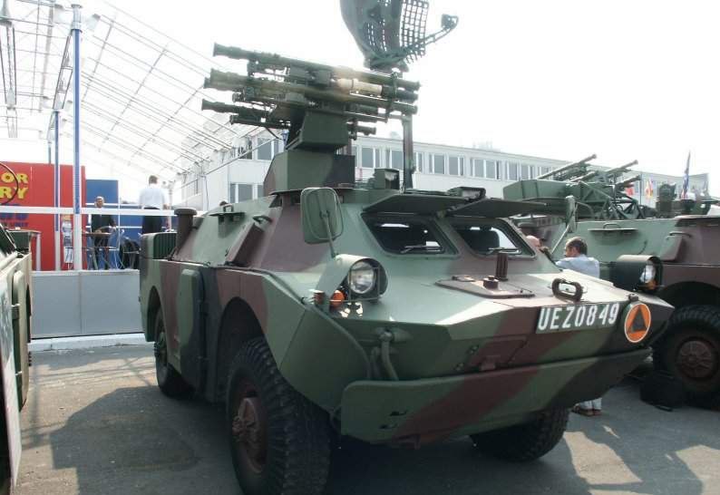 A BRDM-2 armored vehicle equipped with man-portable air-defense system (MANPADS) launchers configured for short-range air defense operations.